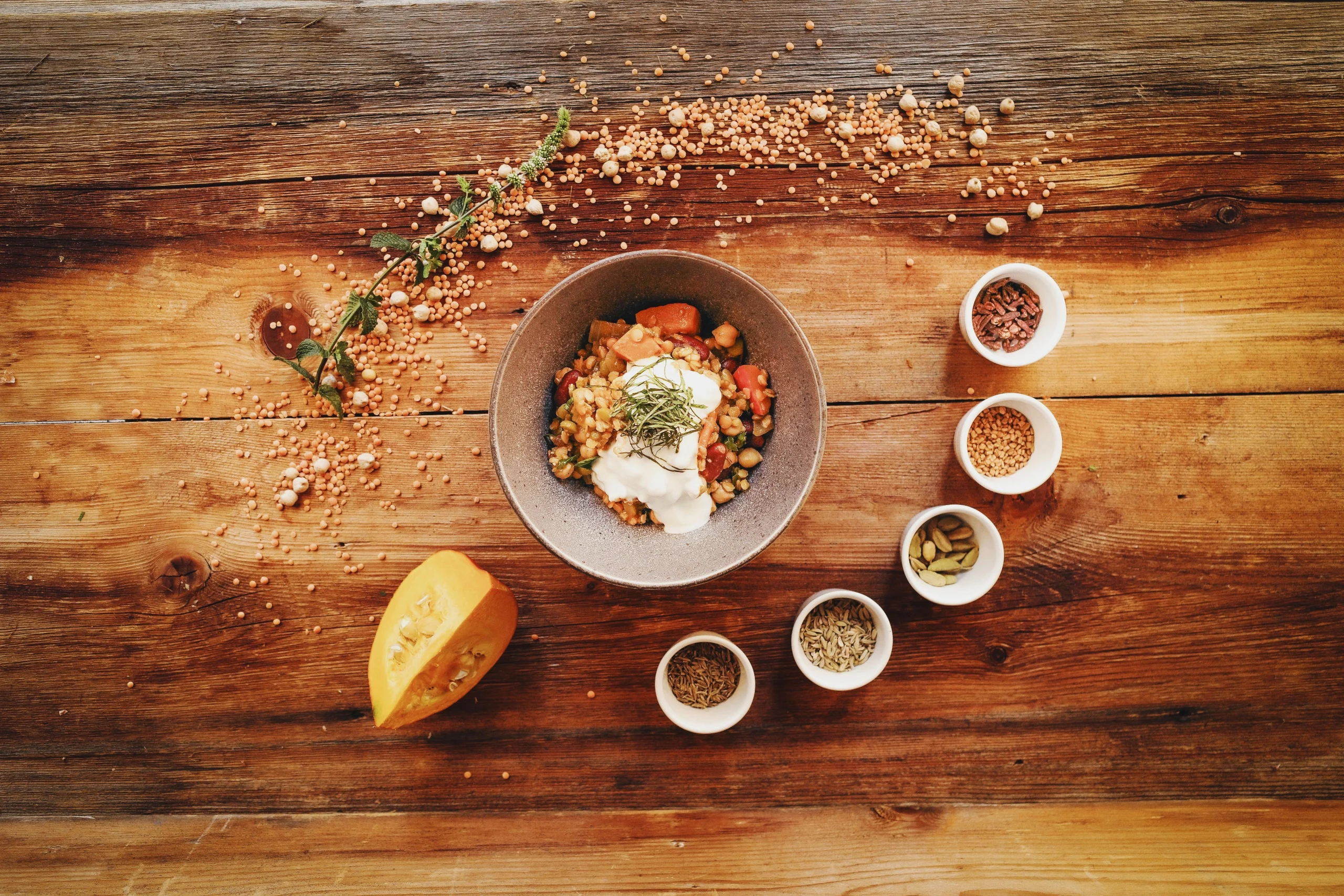 autumn-pumpkin-recipes-in-a-grain-bowl-with-herbs-and-fresh-toppings-scaled 6 Autumn Pumpkin Recipes That Keep Seasonal Cooking Simple