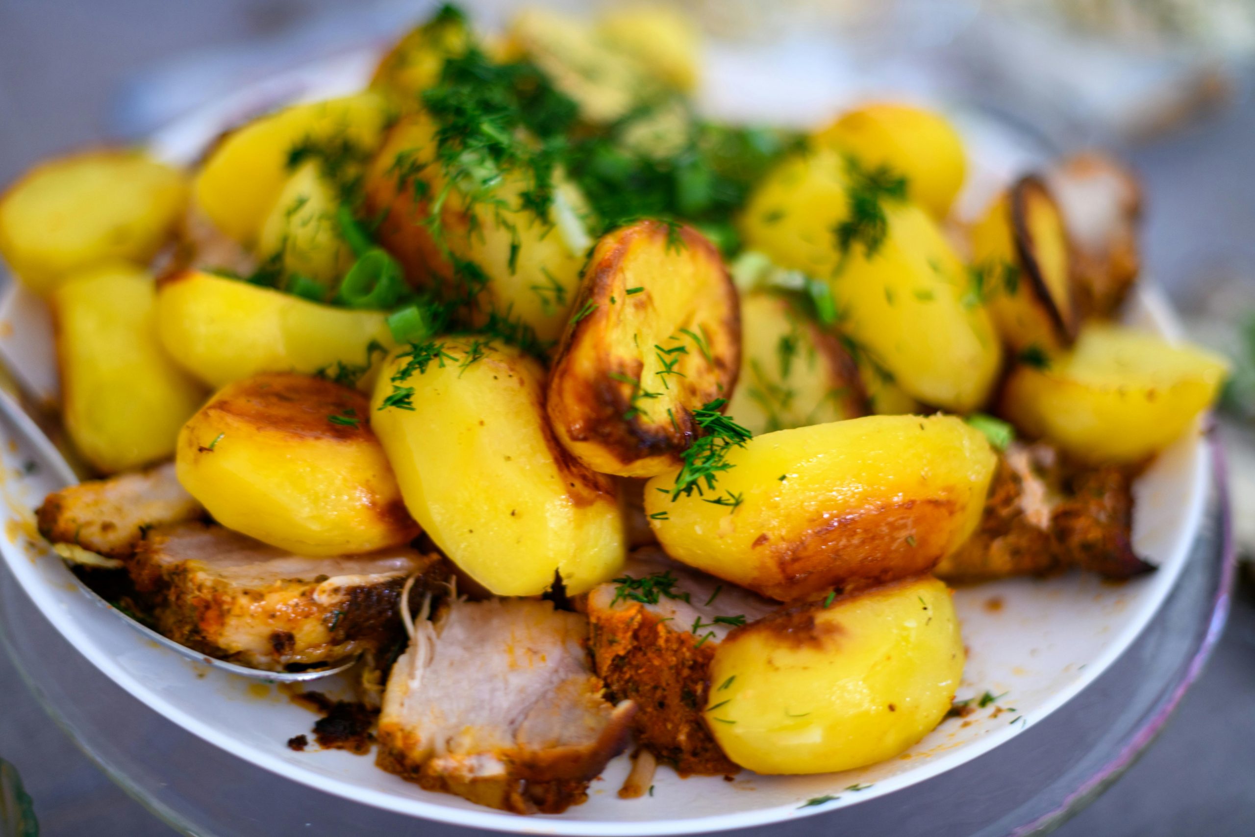 guide to roasting potatoes with evenly cut pieces before oven cooking